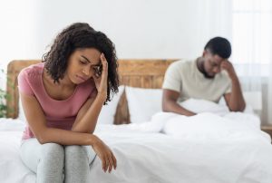 A couple appear to be having a relationship as the woman sits at the end of the bed with her partner nearby. They both agree intimacy counseling in Madison, AL could help their relationship. Journey to New Beginnings offers sexual intimacy therapy in Huntsville, AL, intimacy counseling for couples, and more. Contact us to start sex and intimacy therapy today.